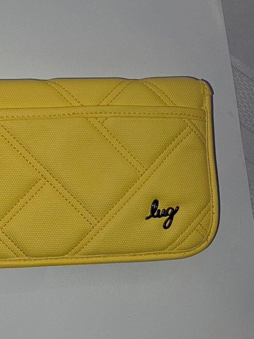 Lug Tango Matte Luxe VL Travel RFID Wallet in bright yellow